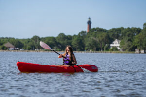 A paddler enjoys calm water near Corolla Park